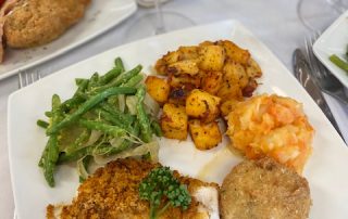 Baked Cod Fillet, Sun Dried Tomato & Herb Crust accompanied with white wine & cream sauce
