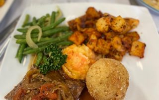 Peppered Crusted Slow Cooked Beef with Braised Onions