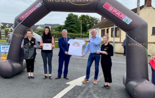 Staff at Mulkerns SPAR Jonesborough photgraphed with Jonesborough PS Principal Mr Keenan at The Lockdown Leavers Event