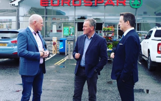 Terry Mulkerns with Finance Minister Conor Murphy, and Glyn Roberts Retail NI
